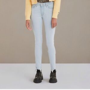 LEVI'S 711 MIDRISE frayed SKINNY JEANS